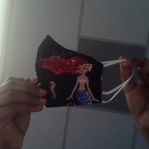 A black mermaid mask!